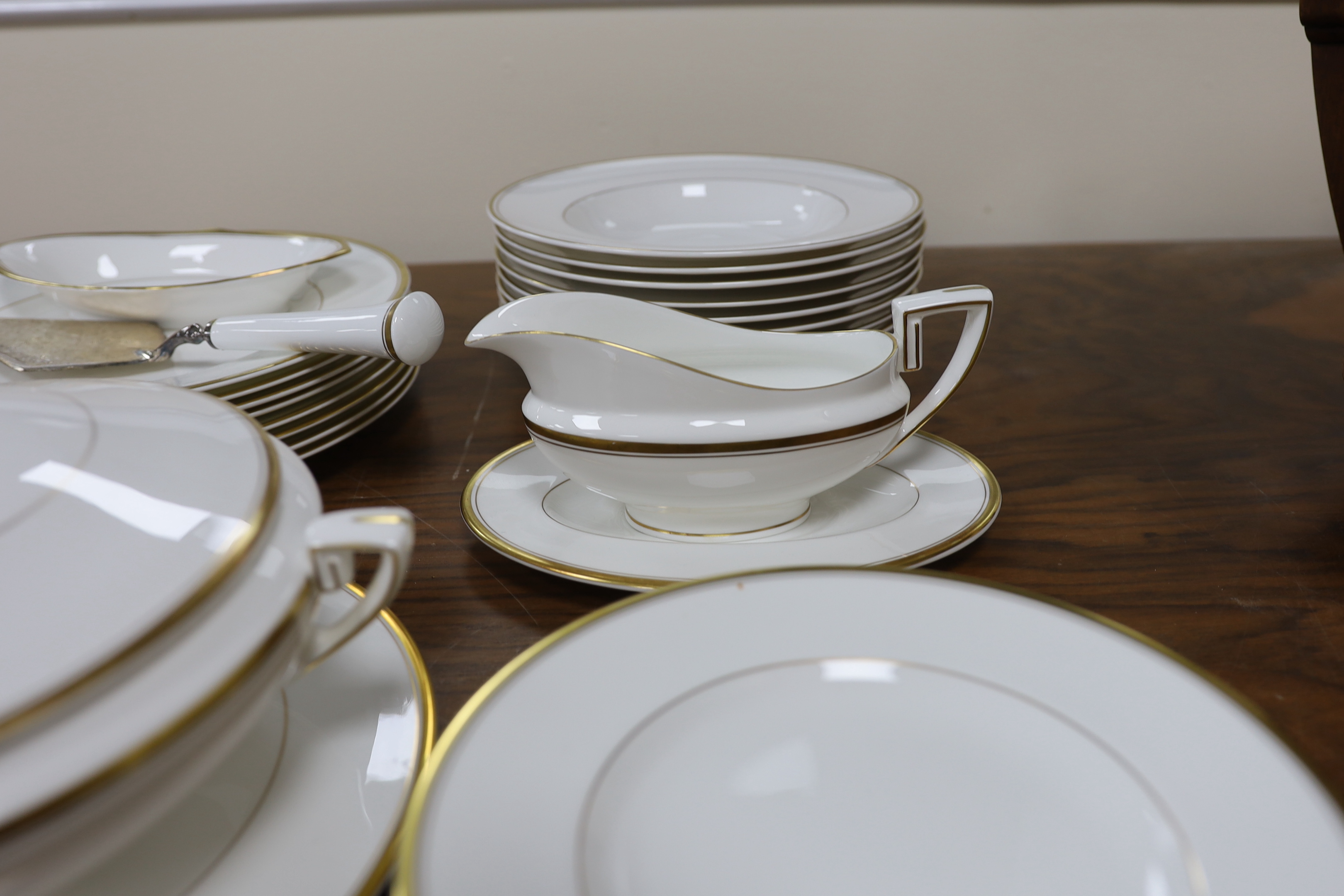A Worcester ‘Viceroy’ part dinner service, including a bread/cake plate and a cake slice